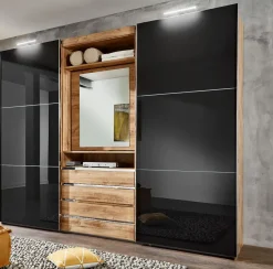 Armoire à portes coulissantes avec miroir pivotant intégré MAGIC GLAS