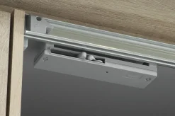 Système d'amortissement à la fermeture pour armoire à portes coulissantes IZH06